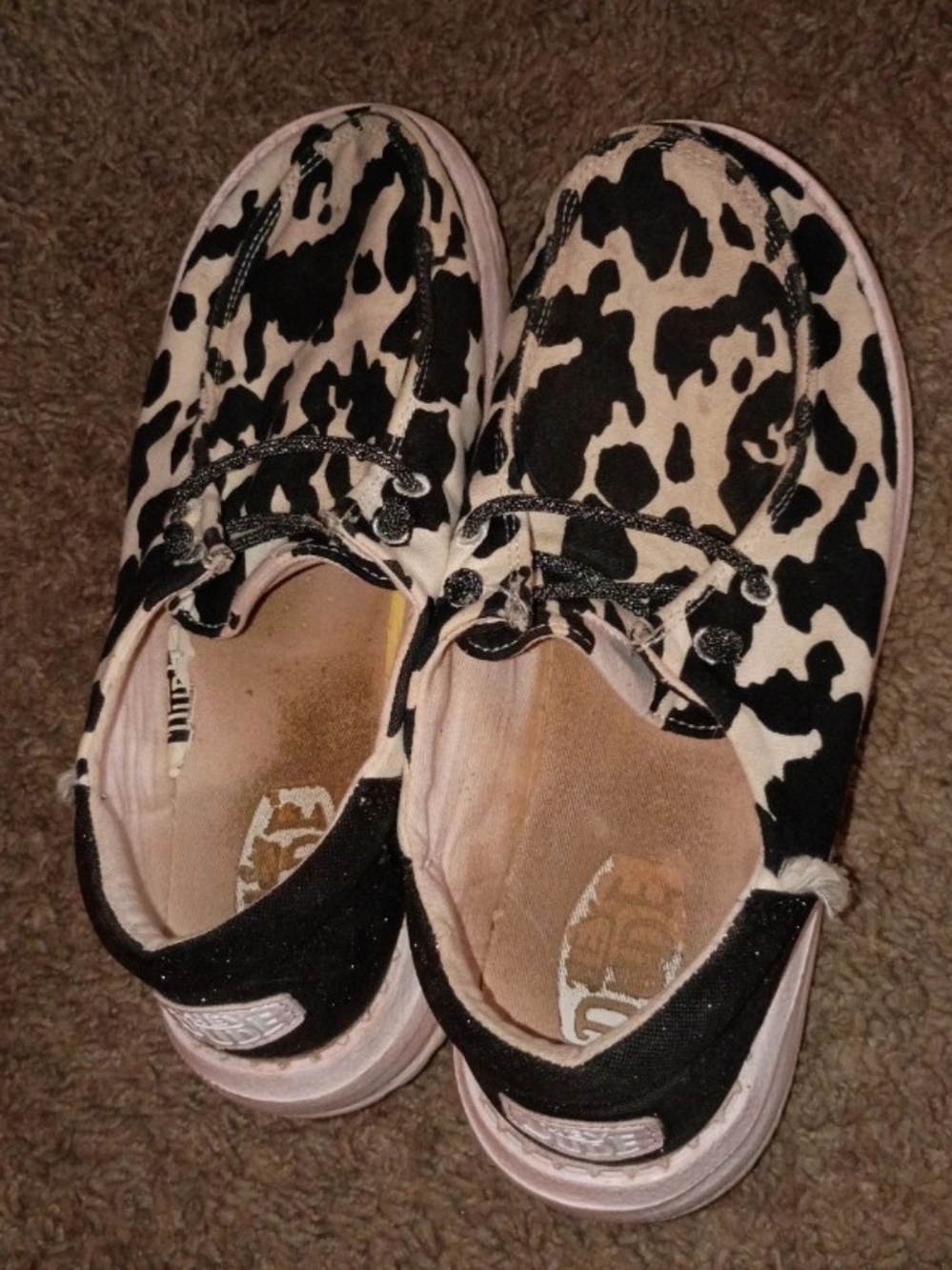 Hey Dude Kids Cow-Print Slip-On Sneakers in Black and White